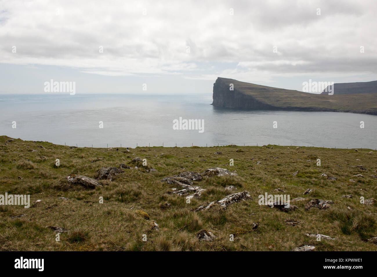 Typical landscape on the Faroe Islands with the island Svinoy Stock Photo