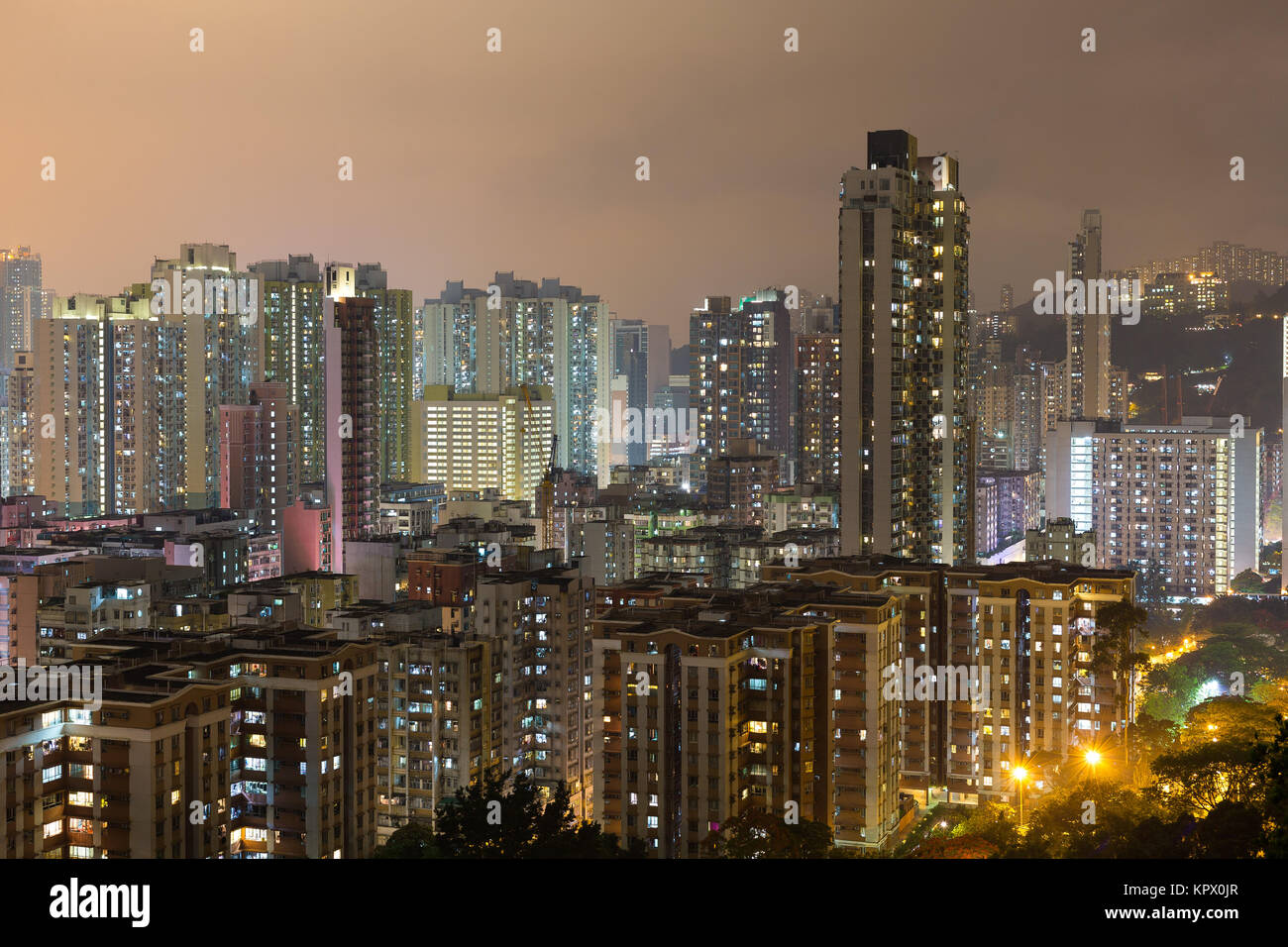 Hong Kong apartment building at night Stock Photo - Alamy