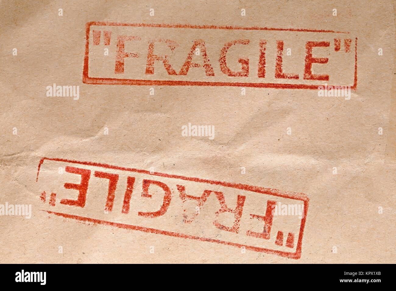 Fragile stamp closeup Stock Photo