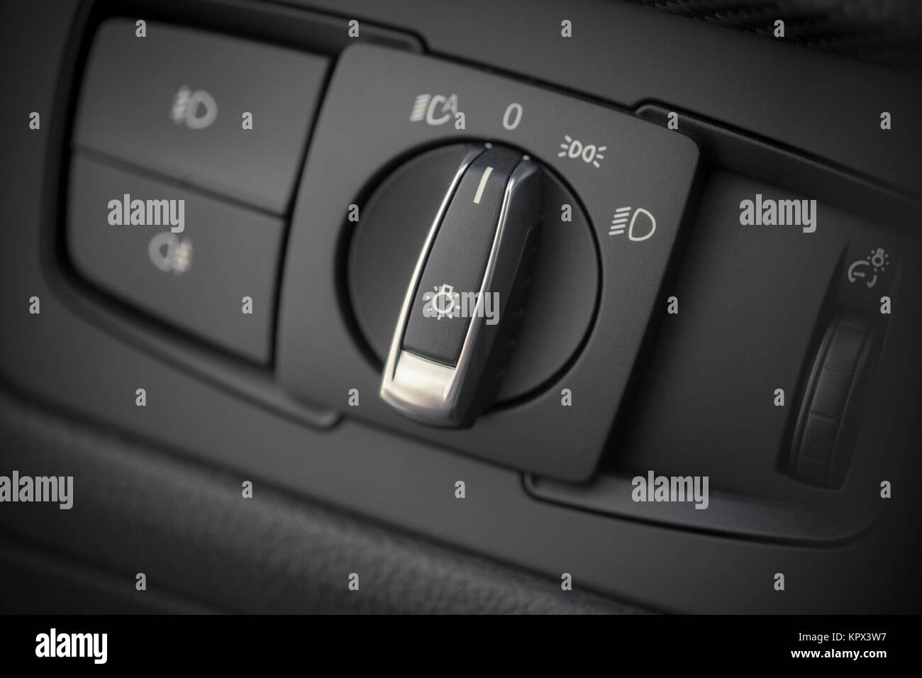 Headlights button in a car Stock Photo Alamy