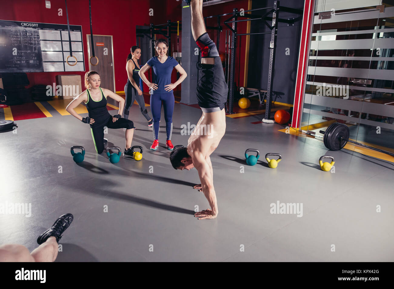 Handstand pushup man workout gym Stock Photo Alamy