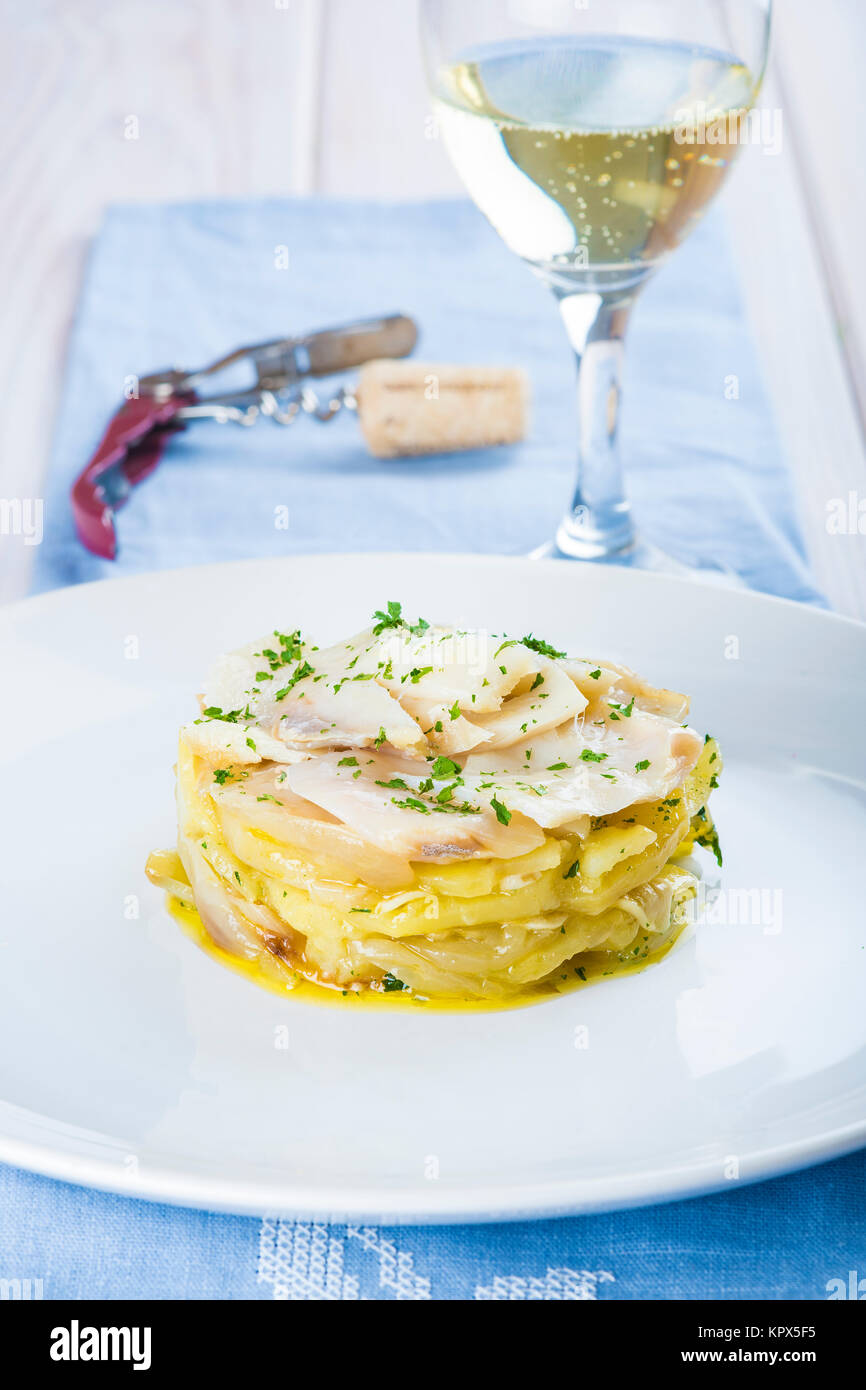 Oven baked cod fish with potatoes Stock Photo - Alamy