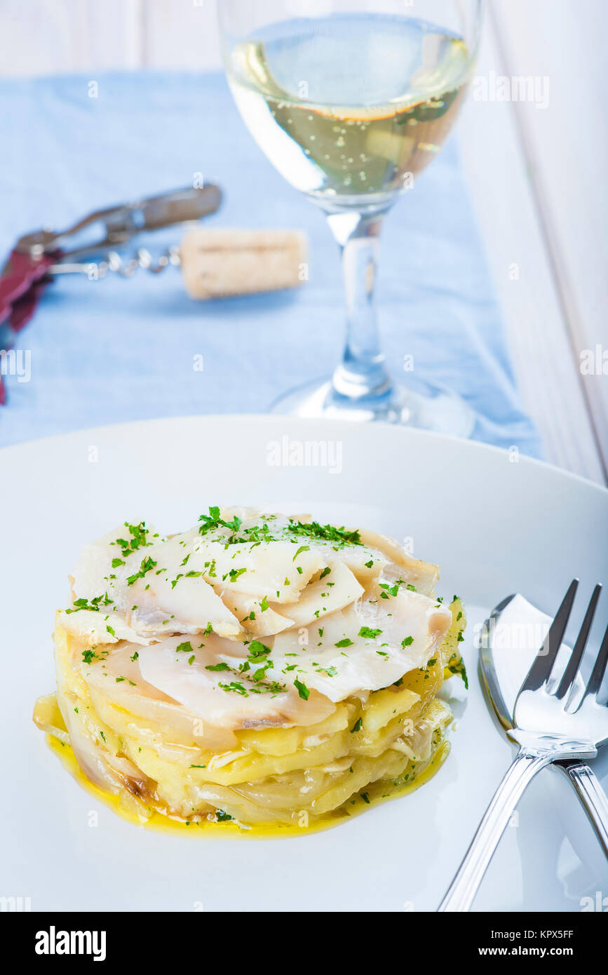 Oven baked cod fish with potatoes Stock Photo - Alamy