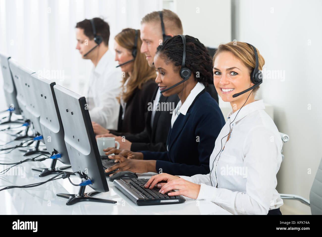 Call Center Operators In Office Stock Photo - Alamy