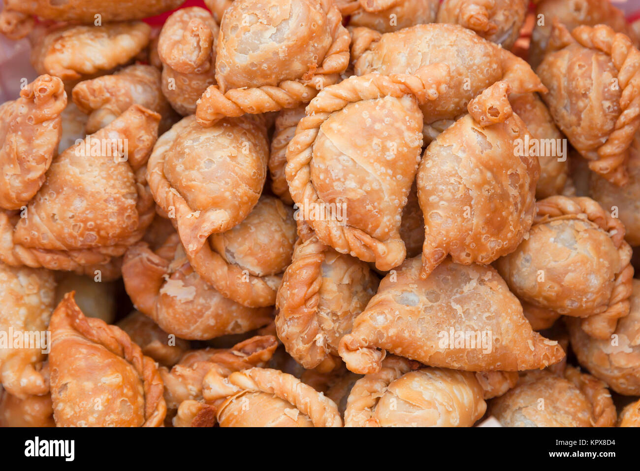 Curry puff, newly fried curry puff, snack, pastry, stuffed bread Stock Photo
