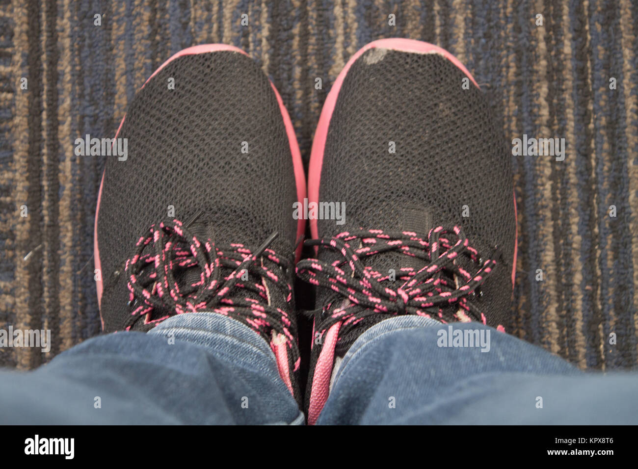 Top view of black shoe on carpet Stock Photo Alamy