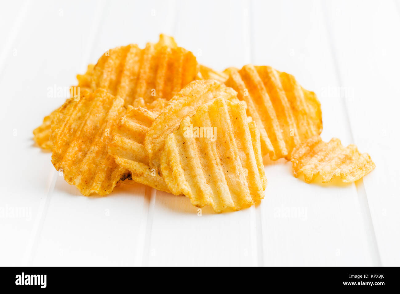 Crinkle cut potato chips Stock Photo Alamy