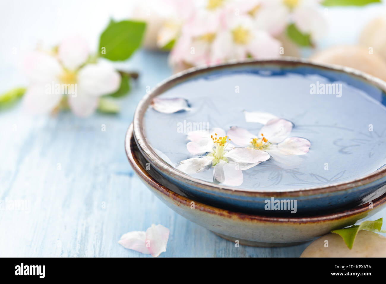 Scented water and flowers Stock Photo Alamy