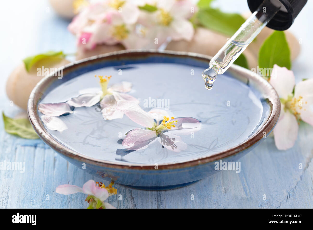 Scented water and flowers Stock Photo Alamy