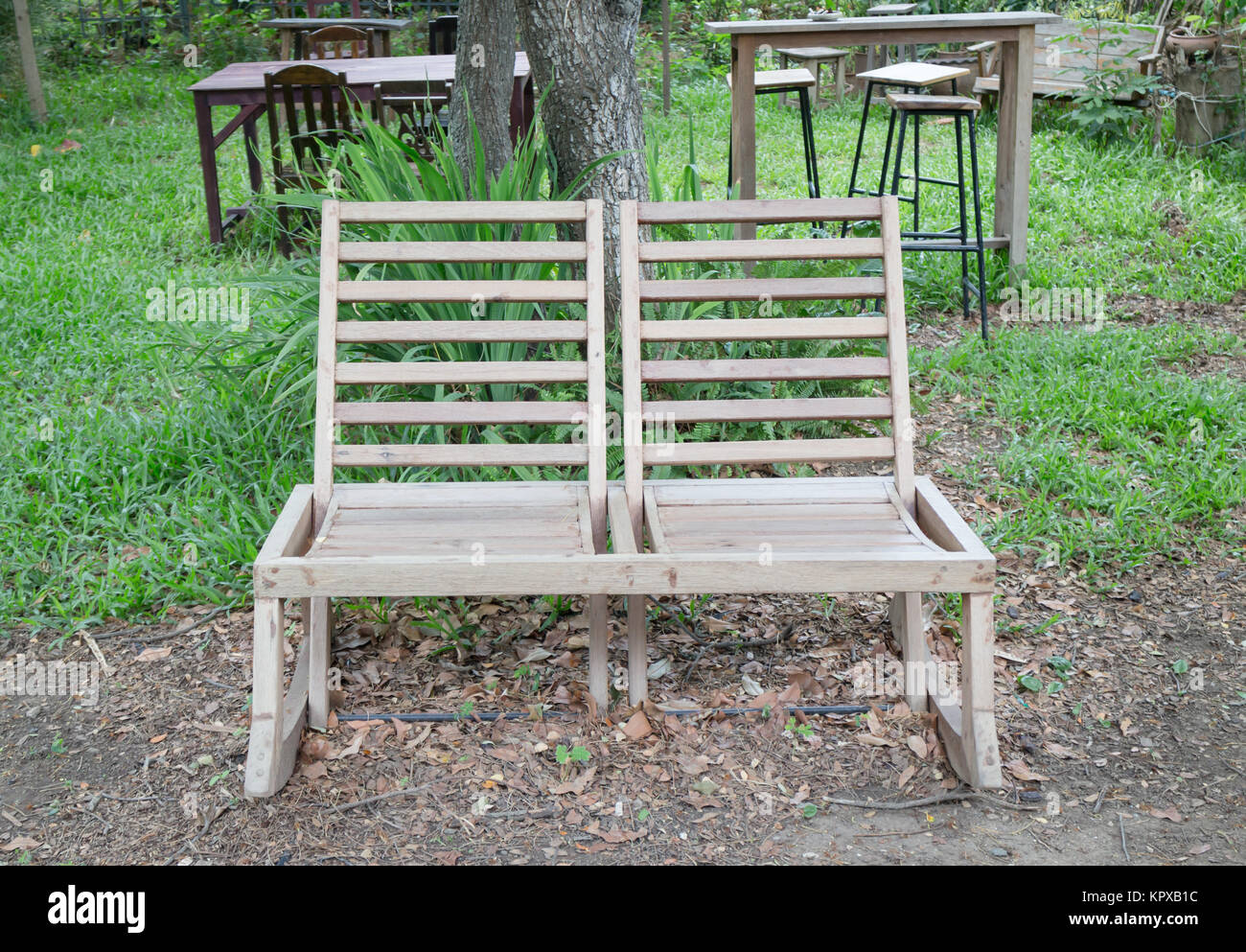 Rustic garden wooden chairs hires stock photography and images Alamy