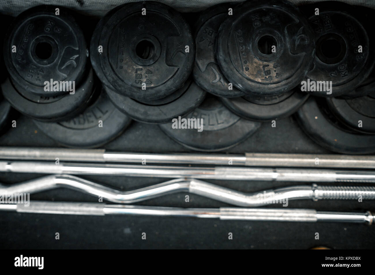 equipment for weightlifting: dumbbells and barbells Stock Photo