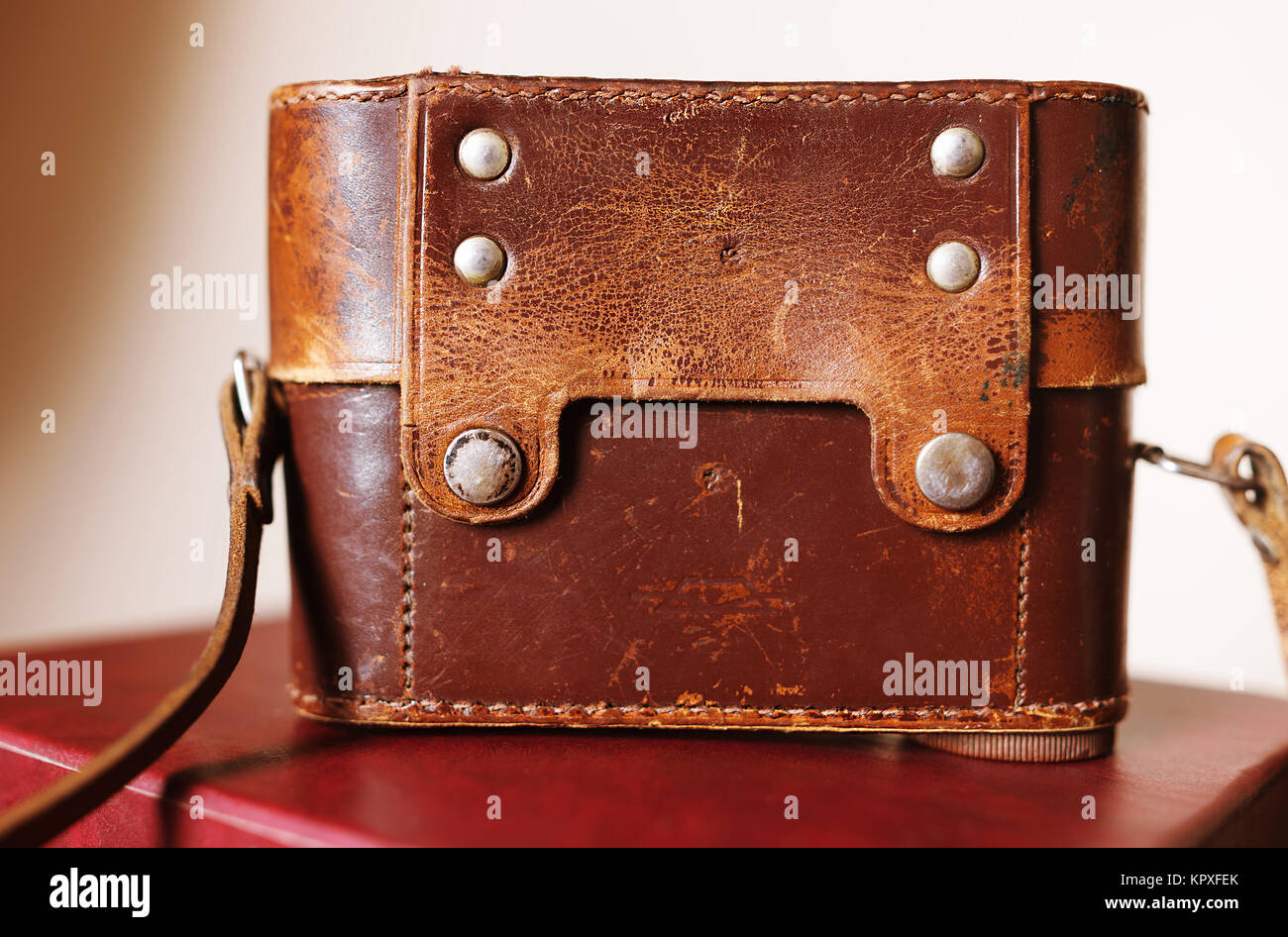 Vintage leather camera case background Stock Photo - Alamy