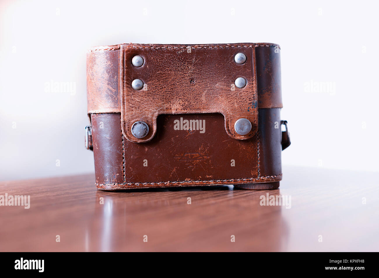 Vintage leather camera case background Stock Photo Alamy