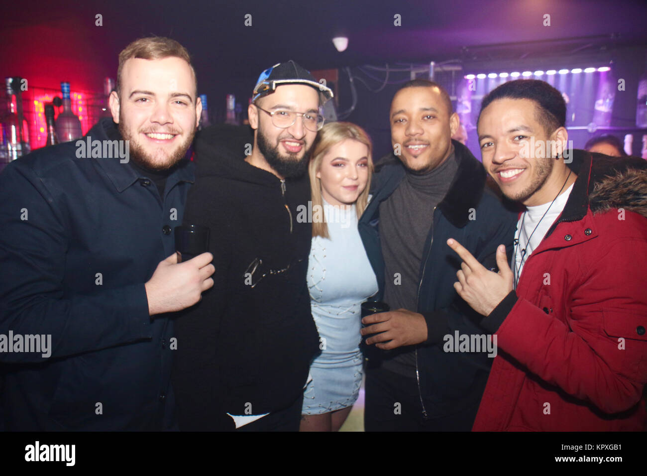 London, UK. 16th December, 2017. X Factor winner and Rak-Su star Mustafa Rahimtulla returns to his former workplace Hydeout 2.0 for night out with friends enjoying some weekend downtime after X Factor whirlwind. Mus previously worked at the club as a promoter. He posed for pictures with groups of fans before being escorted to the toilet by a doorman. Mustafa partied with his friends and former colleagues. Earlier in the day he ate out at Watford's Wagamamas alongside bandmates Myles Stephenson and Jamal Shurland. Credit: Ayeesha Walsh/Alamy Live News Stock Photo