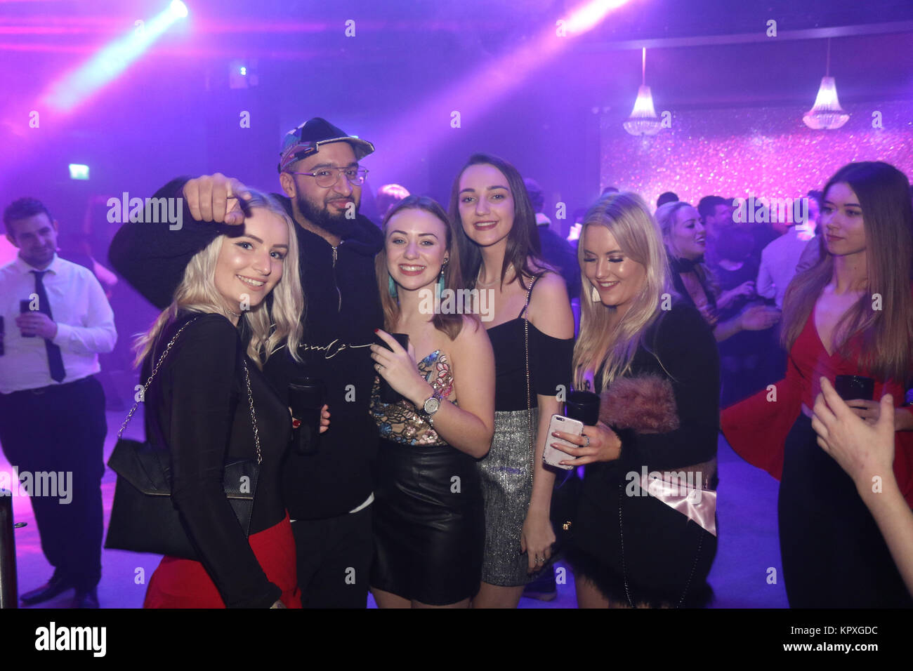 London, UK. 16th December, 2017. X Factor winner and Rak-Su star Mustafa Rahimtulla returns to his former workplace Hydeout 2.0 for night out with friends enjoying some weekend downtime after X Factor whirlwind. Mus previously worked at the club as a promoter. He posed for pictures with groups of fans before being escorted to the toilet by a doorman. Mustafa partied with his friends and former colleagues. Earlier in the day he ate out at Watford's Wagamamas alongside bandmates Myles Stephenson and Jamal Shurland. Credit: Ayeesha Walsh/Alamy Live News Stock Photo
