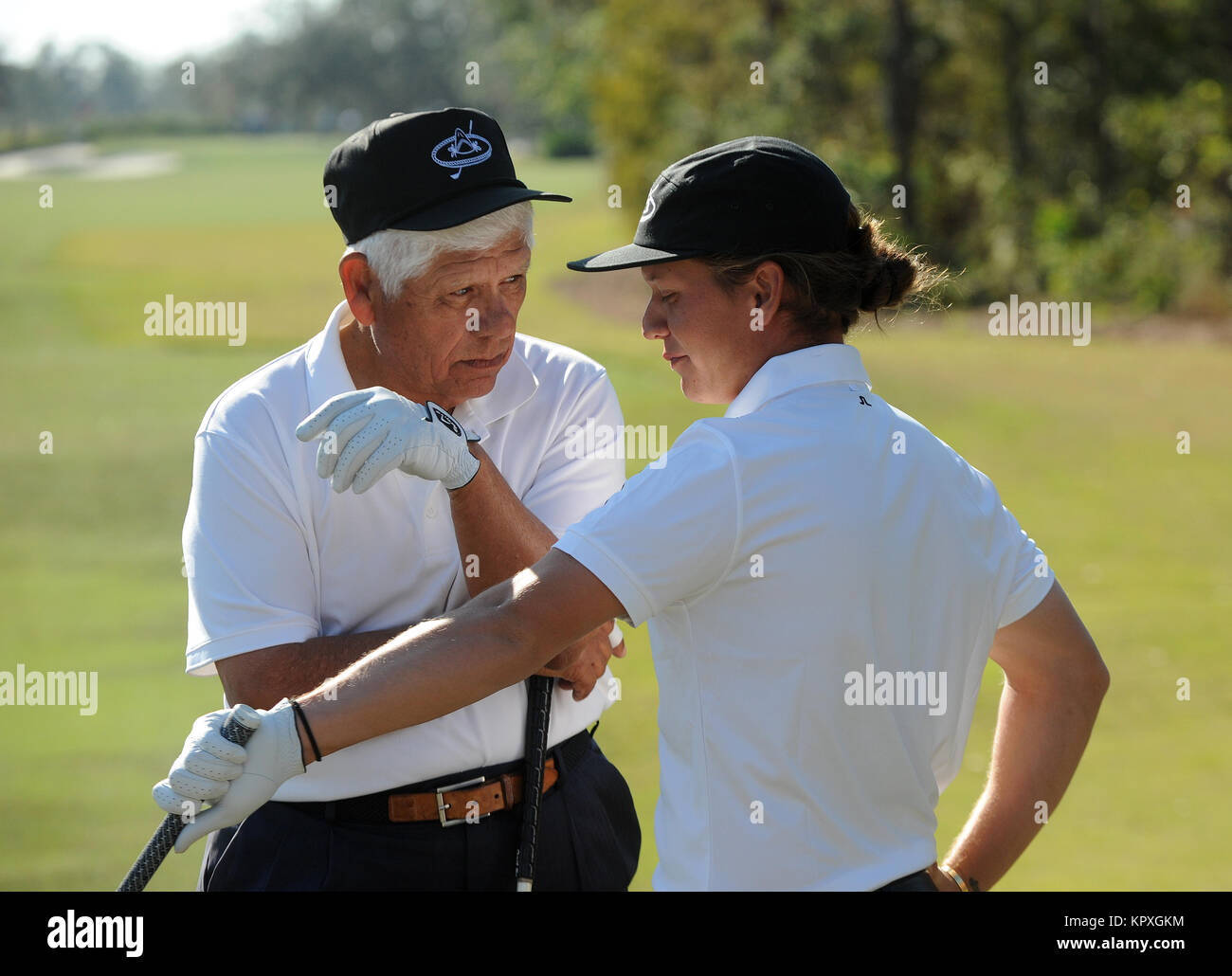 Orlando, United States. 16th Dec, 2017. Lee Trevino (left) chats with his  son, Daniel, before teeing off on the first hole during round one of the  2017 PNC Father Son Challenge golf