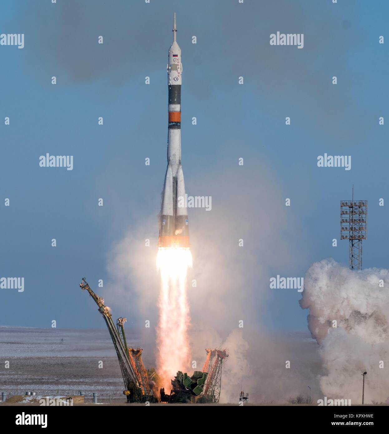 The Russian Soyuz rocket and Soyuz MS-07 spacecraft blast off from the launch pad carrying the International Space Station Expedition 54 mission crew at the Baikonur Cosmodrome December 17, 2017 in Baikonur, Kazakhstan. International Space Station Expedition 54 crew cosmonaut Anton Shkaplerov of Rosmos, astronaut Scott Tingle of NASA, and astronaut Norishige Kanai of JAXA will spend the next five months living and working aboard the orbiting laboratory. Stock Photo