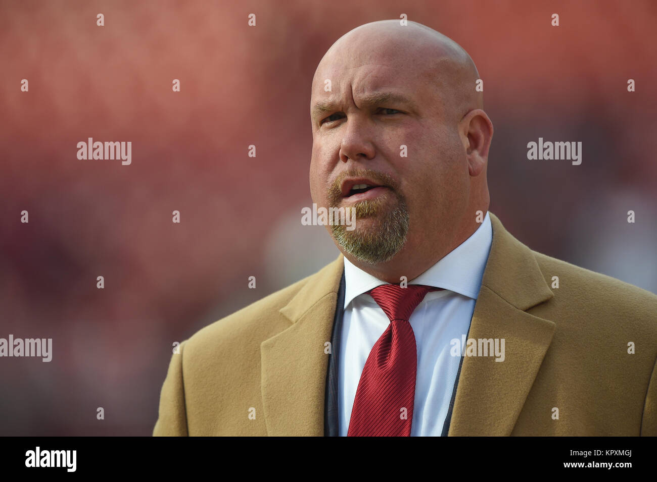 DEC 17 2017 : Arizona Cardinals General Manager Steve Keim walks the field prior the matchup between the Arizona Cardinals and the Washington Redskins at FedEx Field in Landover, MD. Stock Photo