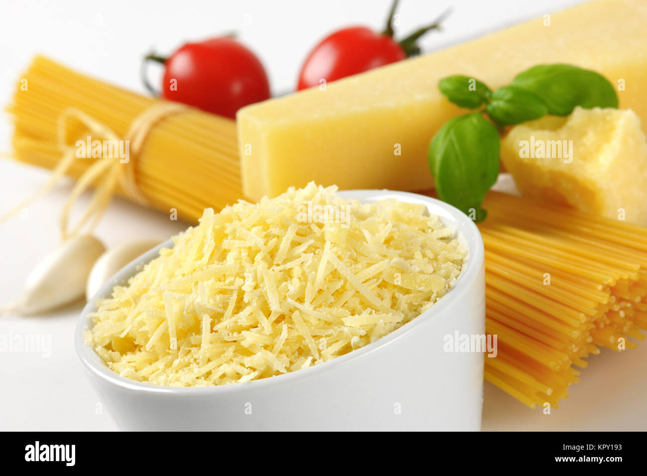 parmesan cheese and uncooked spaghetti Stock Photo Alamy