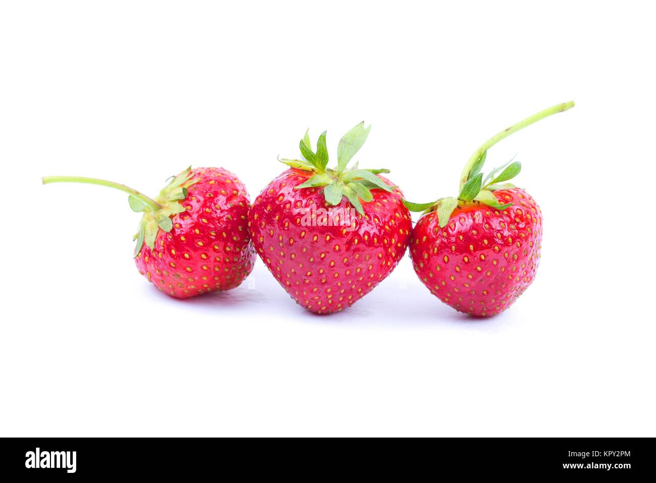 Fresh strawberries on a white background Stock Photo - Alamy