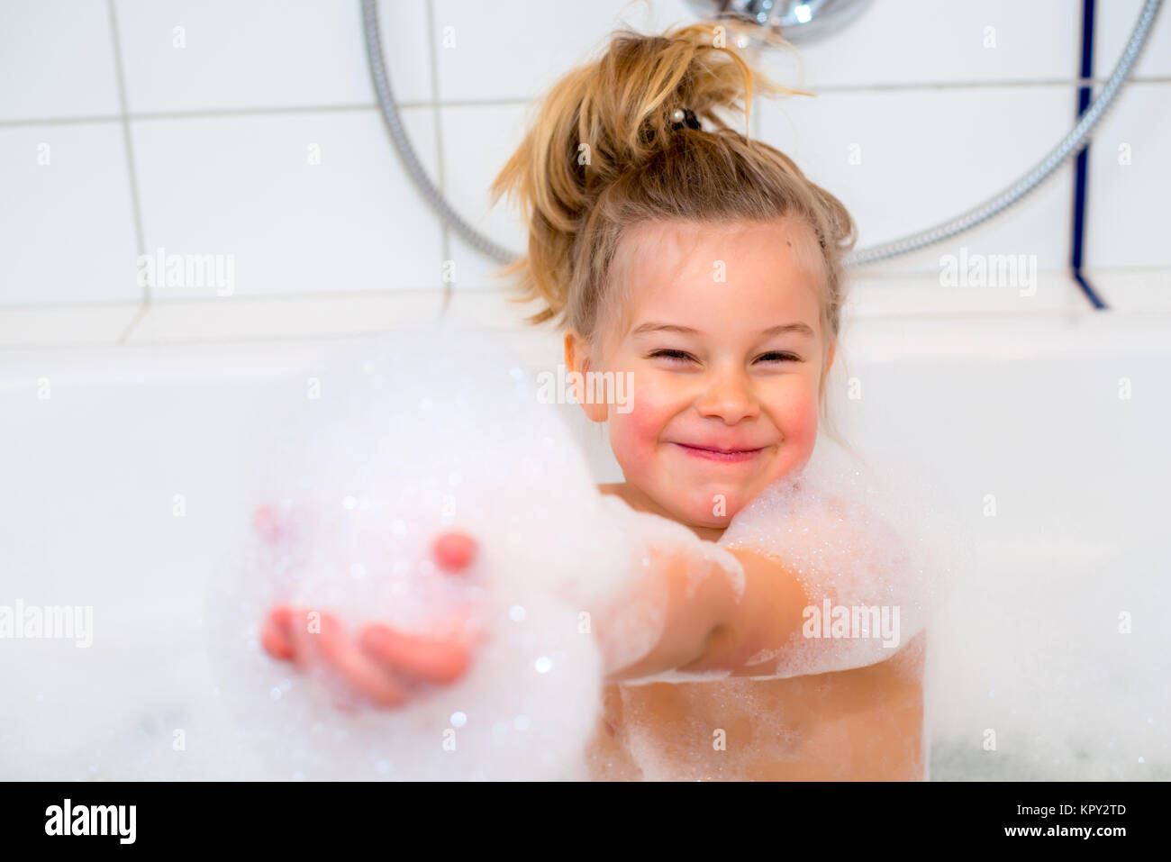 little funny girl with foam bathtub in the bathtub Stock Photo Alamy
