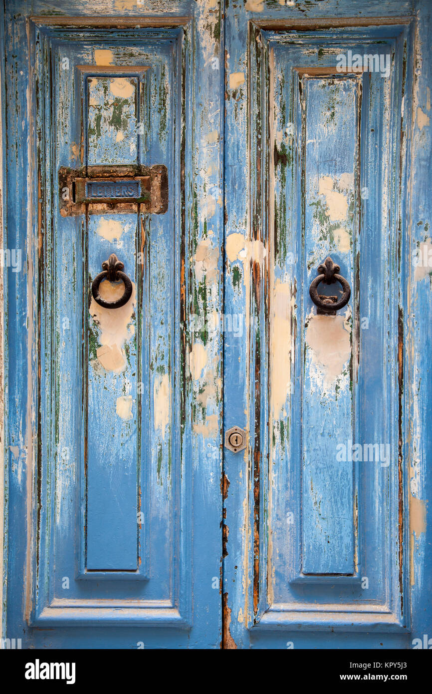 Blue weathered door with door knob and letter box Stock Photo - Alamy