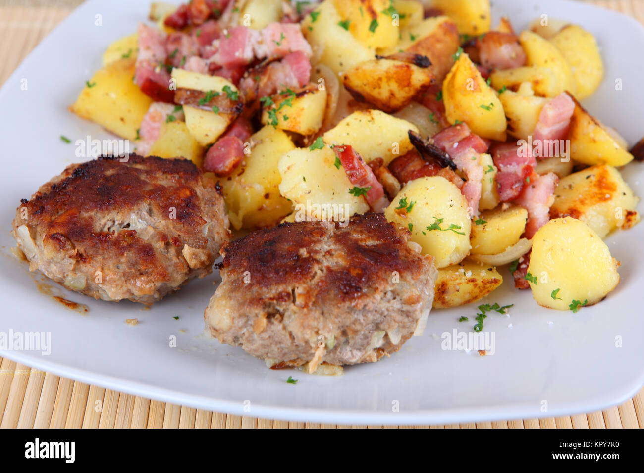 meatballs with fried potatoes Stock Photo