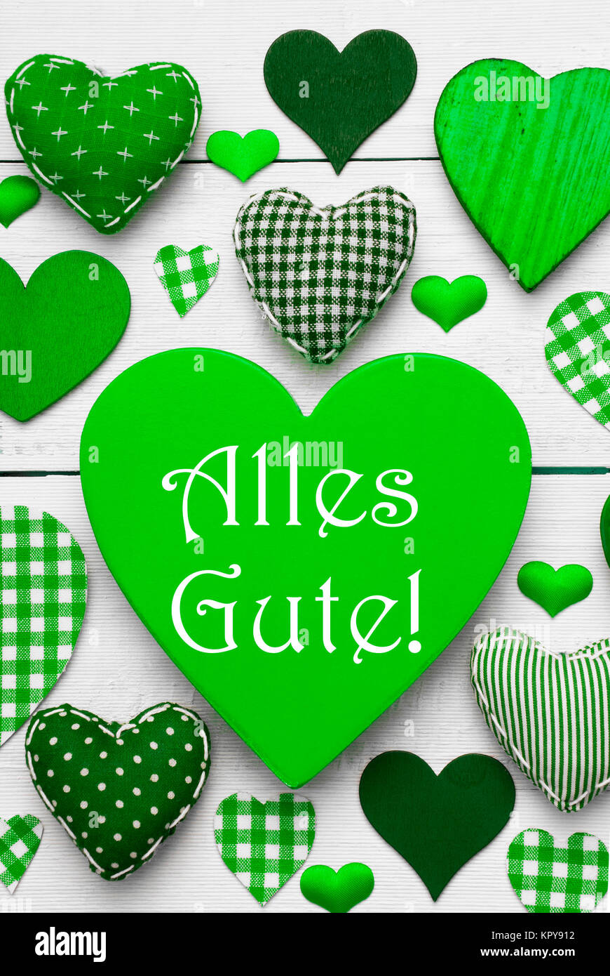Green Vertical Heart Texture With German Text Alles Gute Means Best Wishes White Wooden Background Textile Hearts Which Are Dotted And Striped Greeting Card For Birthday Wishes Stock Photo Alamy