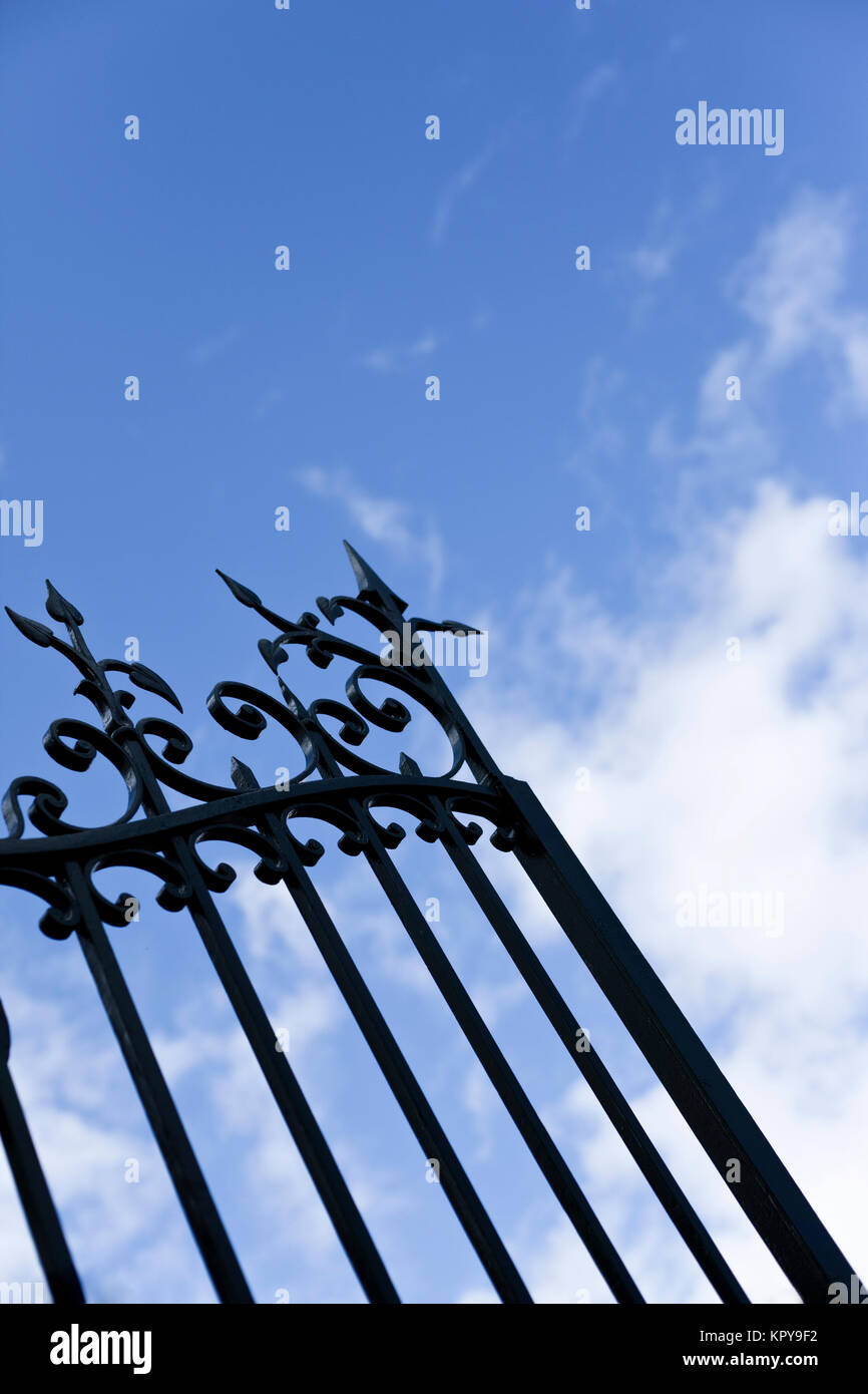 Opening a gate in a park Stock Photo