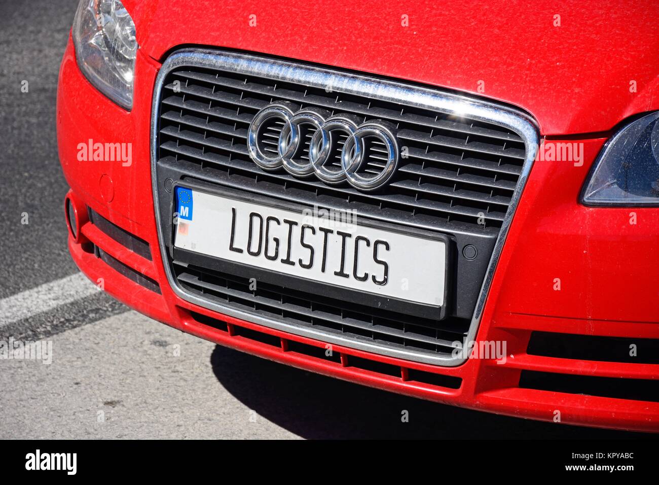 Radiator grill and logistics numberplate on a red Audi car, Malta, Europe. Stock Photo
