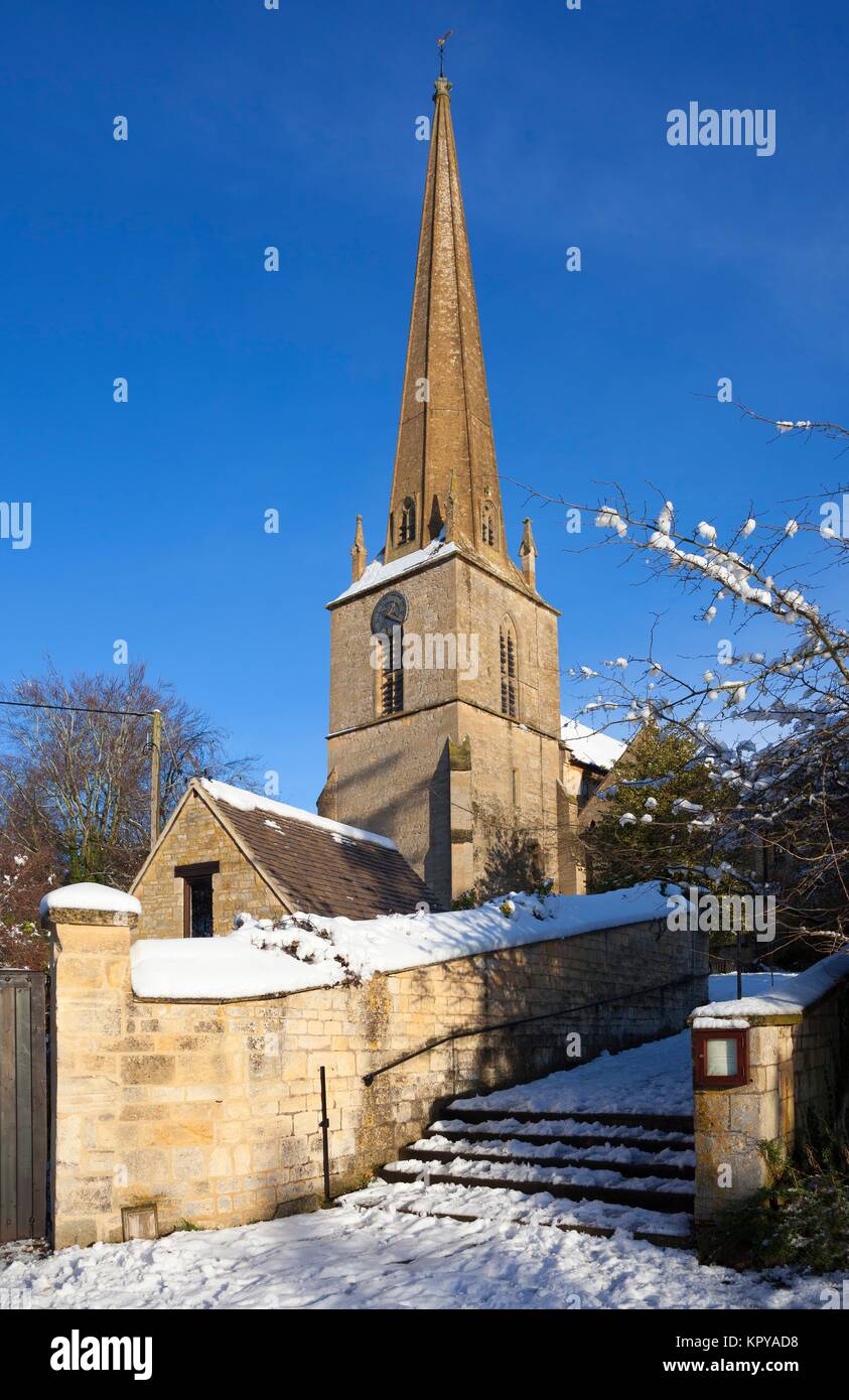 Cotswold church with spire in winter time Stock Photo - Alamy