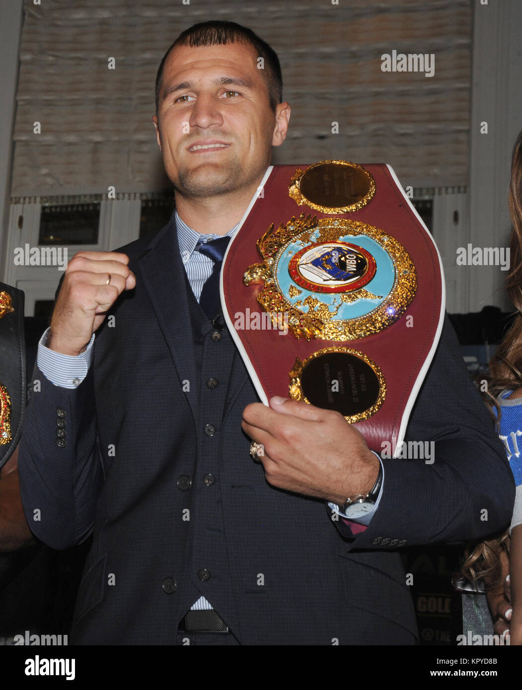 NEW YORK, NY - SEPTEMBER 02: Main Events Productions Inc. CEO Kathryn P. Duva, former professional boxer and Golden Boy Promotions Inc. founder and President Oscar De La Hoya, professional boxer Bernard 'The Alien' Hopkins, his trainer Naazim Richardson, professional boxer Sergei 'Krusher' Kovalev and his manager Egis Klimas promote a planned Saturday, Nov. 8, 12-round light heavyweight bout between Hopkins and Kovalev in Atlantic City, New Jersey, to be televised as part of Home Box Office Inc.'s 'HBO World Championship Boxing' series at The Waldorf-Astoria hotel on September 2, 2014 in New Y Stock Photo