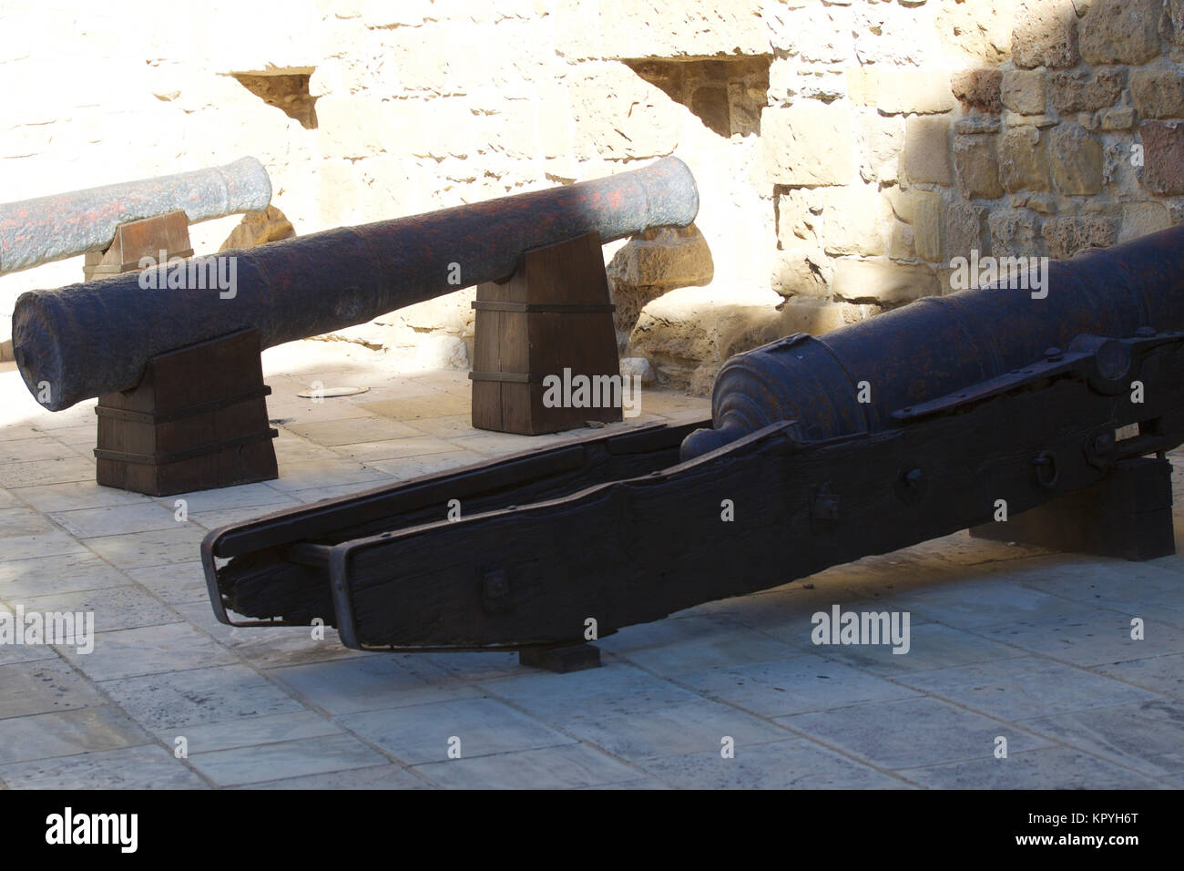 Ancient cannons of defense weapons in the old fortress, the island of