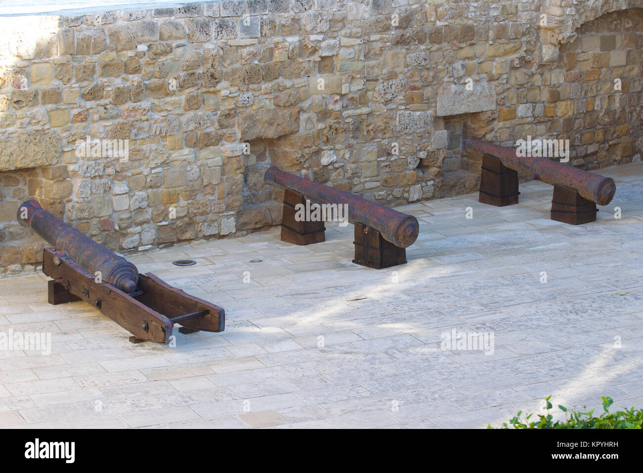 Ancient cannons of defense weapons in the old fortress, the island of