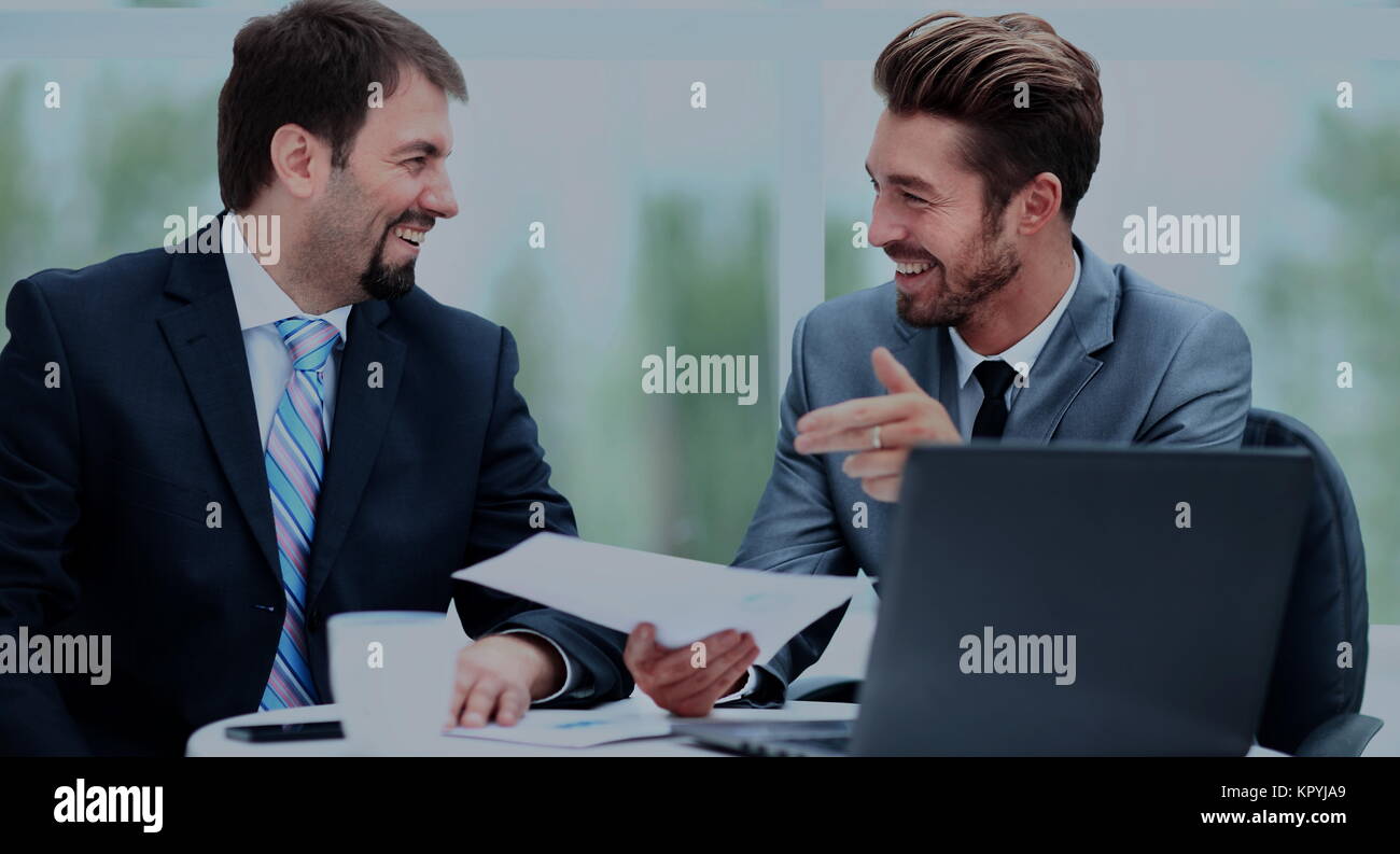 Two businessmen discussing tasks Stock Photo - Alamy