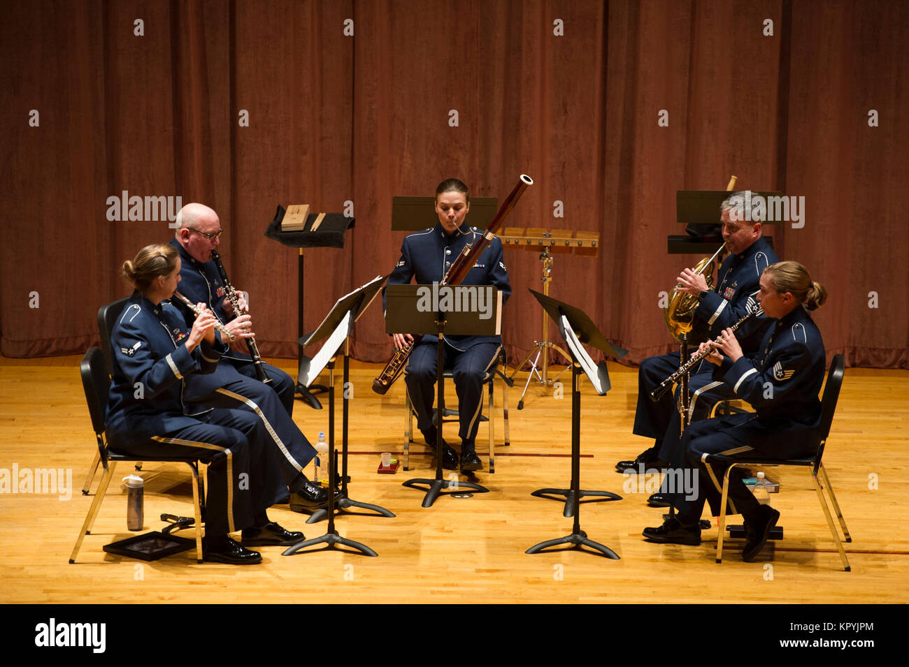 The Air Force Band of the West ensemble Spectrum Winds performs a holiday concert at Midwestern State University's Akin Auditorium Dec. 13, 2017, in Wichita Falls, Texas. The band tours across the United States and performs in various styles that range from classical to country. (U.S. Air Force Stock Photo