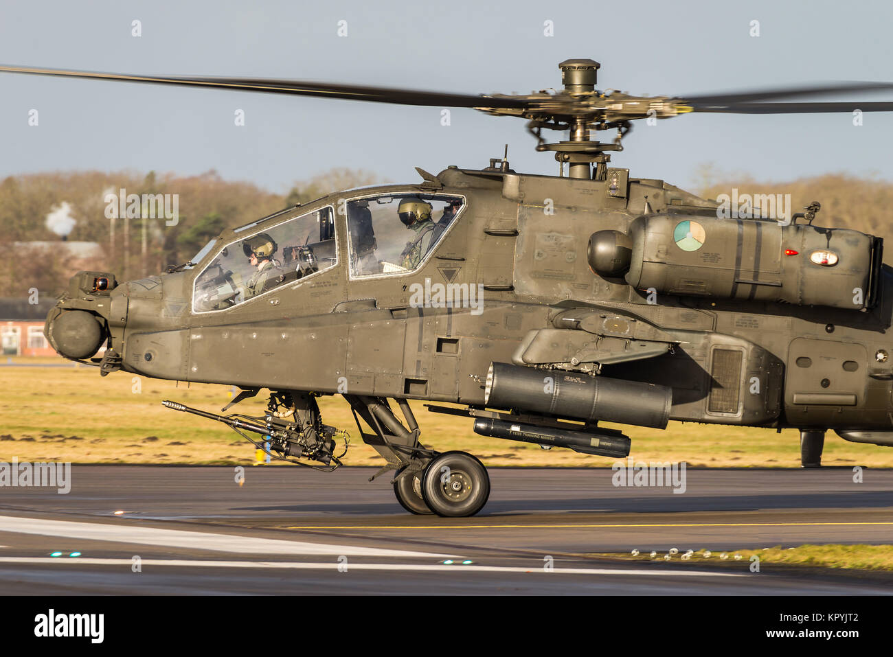 A Boeing AH-64 Apache attack helicopter of the Royal Netherlands Air Force at the Gilze-Rijen Air Base. Stock Photo
