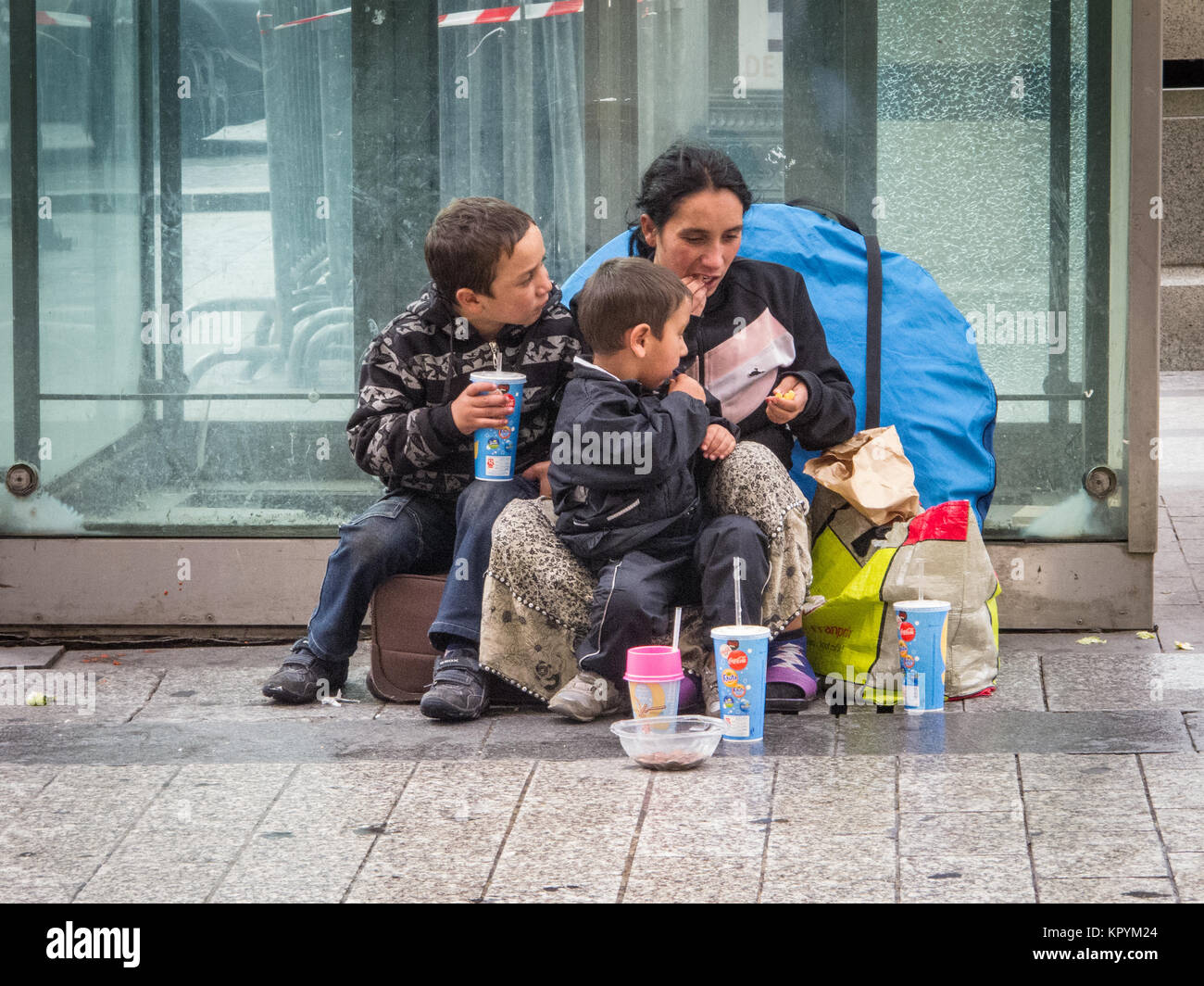 Homeless mother and children, Paris France Stock Photo