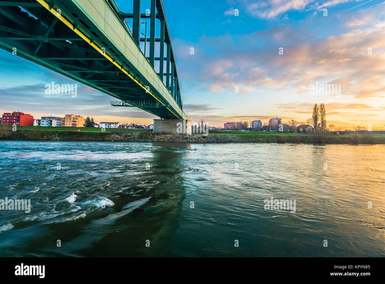 Sunset view at coastline cityscape in Zagreb town, Sava river marble scenery. Stock Photo