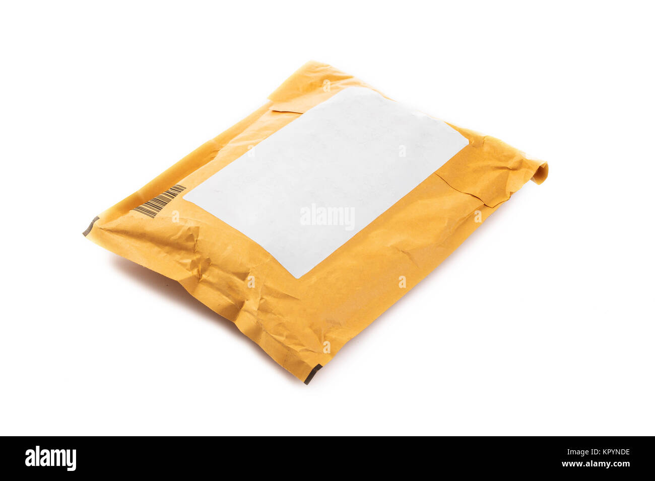 Small paper post packet isolated on the white background Stock Photo