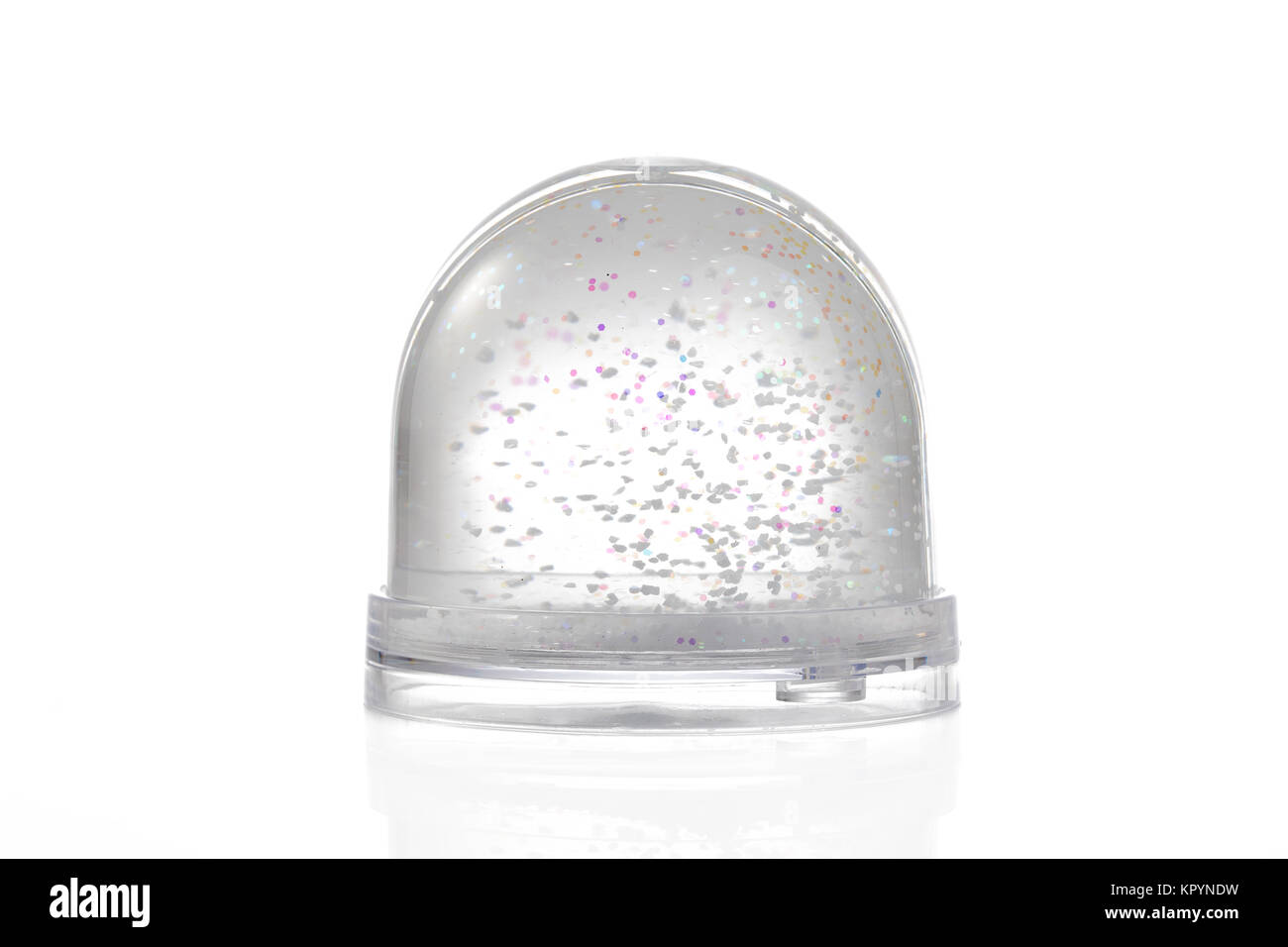 Paperweight with glitter isolated on white. Stock Photo