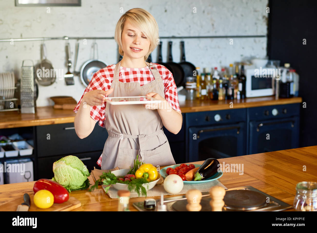 Woman Taking Photo of Ingredients Stock Photo