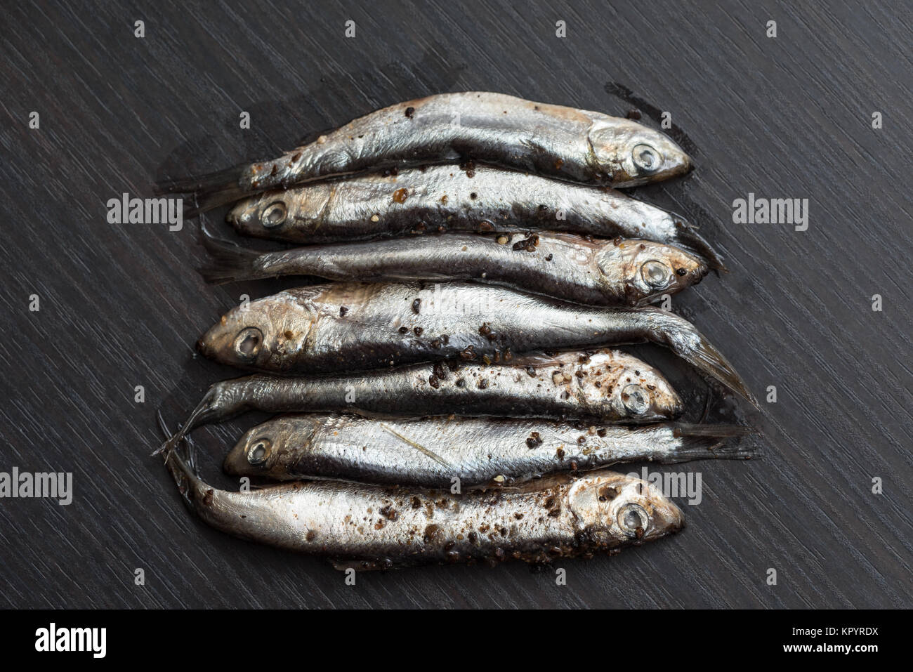 Salt sprat, Estonian national food. Canned fish Stock Photo Alamy