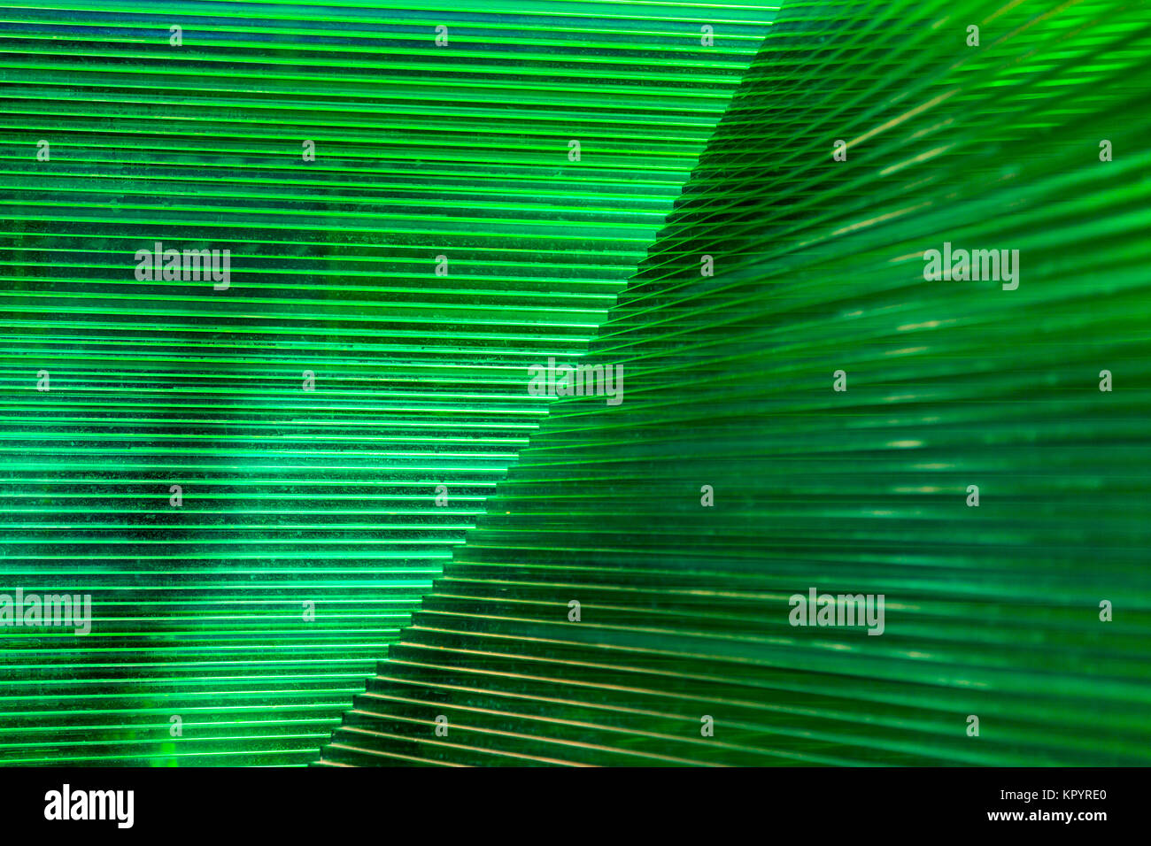 Deep green emerald abstract luminescent lines background Stock Photo