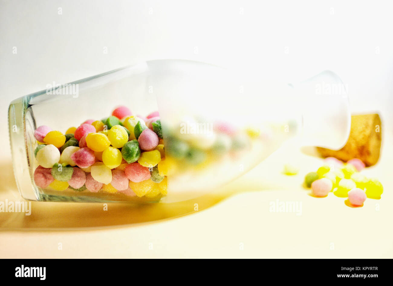 Colourful candy in a glass bottle Stock Photo