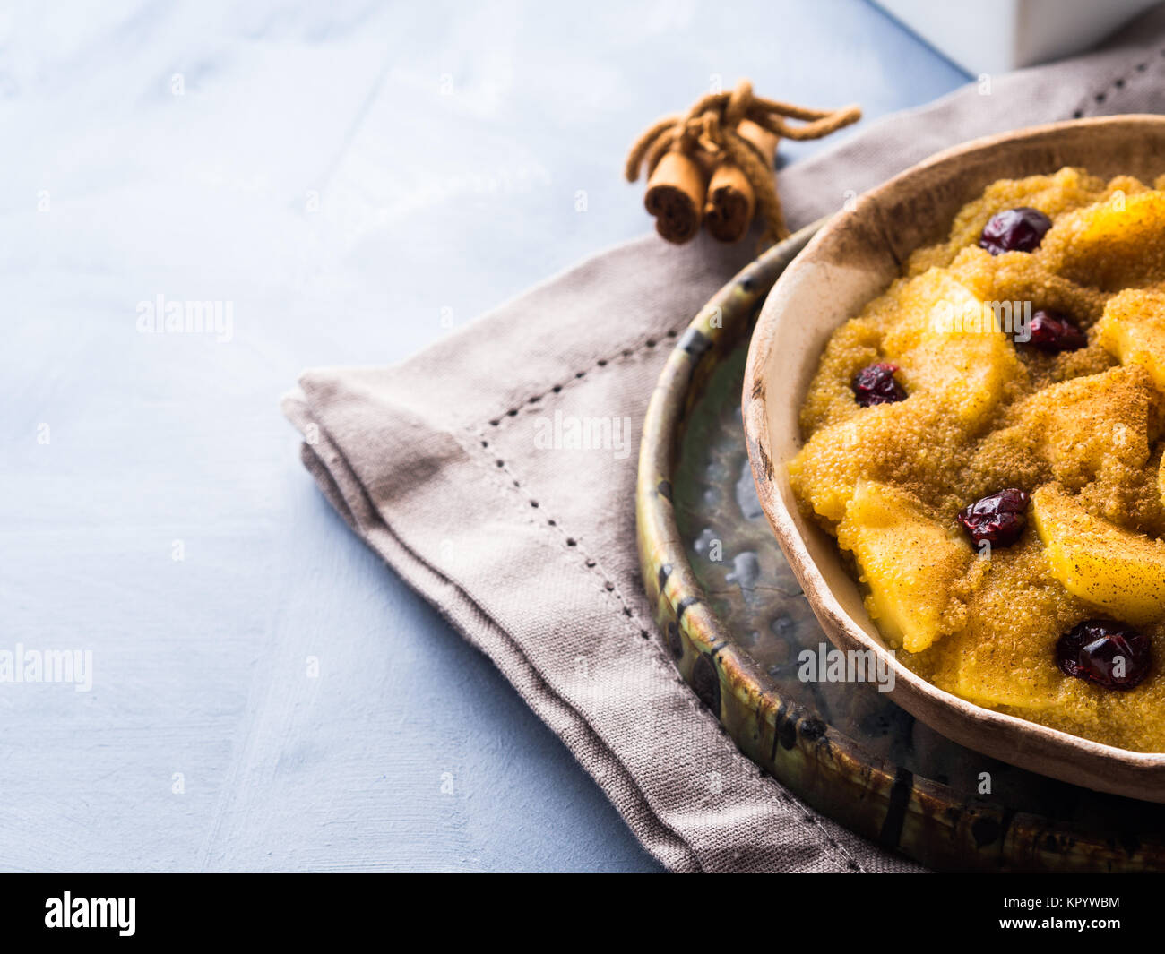 Amaranth porridge with apples, cinnamon, turmeric and dried fruit