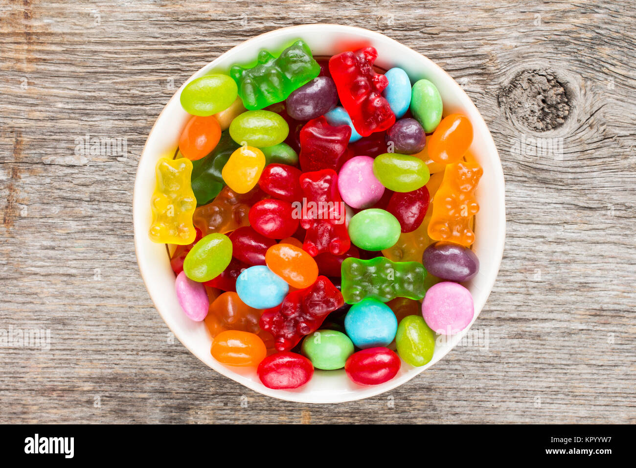 Bowl full of colorful candies. Stock Photo