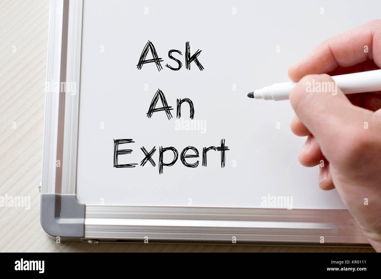 Ask an expert written on whiteboard Stock Photo Alamy