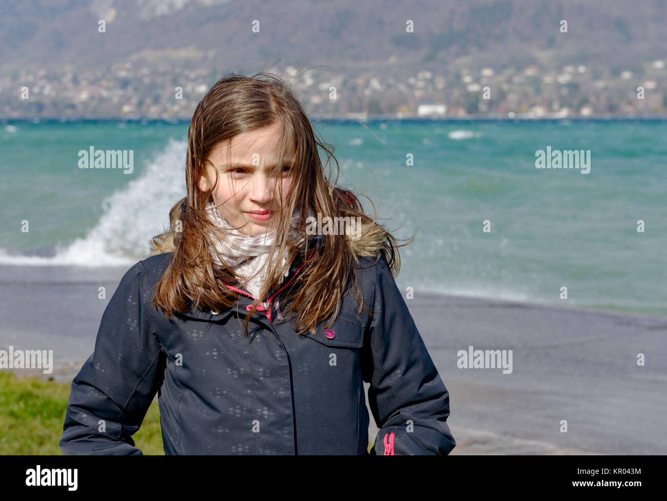 preteen girl with hair in the wind Stock Photo