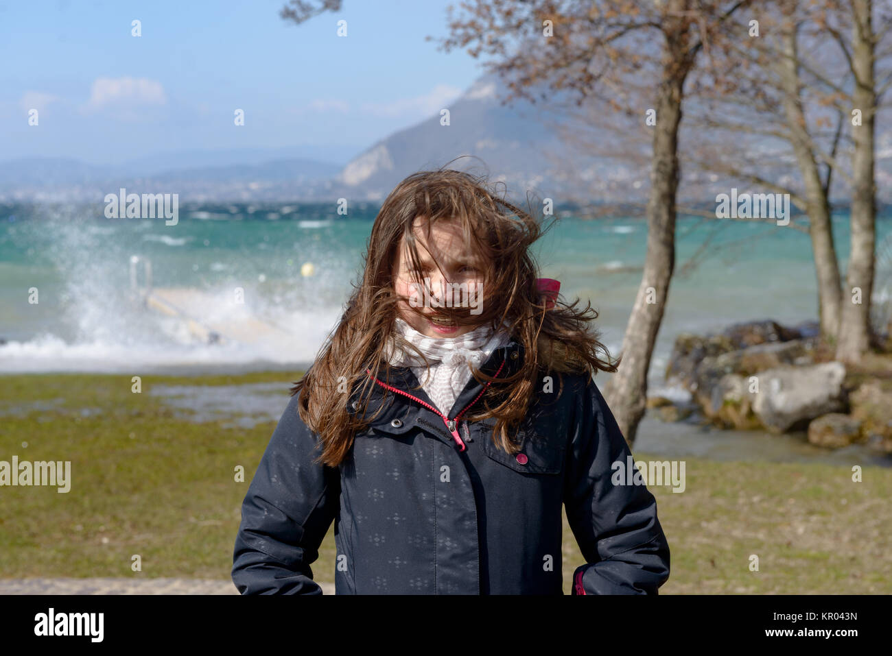 preteen girl with hair in the wind Stock Photo